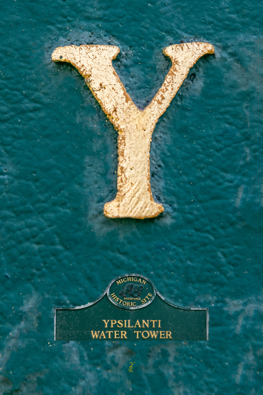 Your Life Letters (YLL) are unique photo letter art from Ypsilanti, Michigan that answers the question, "where was this taken?". Each YLL from A to Z is taken at a location that has memory for the customer and is shown in the upper two thirds of the photo. The sign the letter was taken from is represented in the lower one third of the photo.