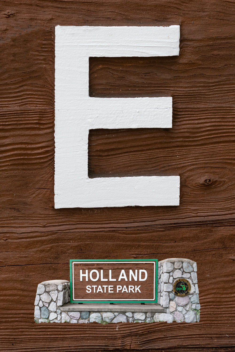Your Life Letters (YLL) are unique photo letter art from Holland, Michigan that answers the question, "where was this taken?". Each YLL from A to Z is taken at a location that has memory for the customer and is shown in the upper two thirds of the photo. The sign the letter was taken from is represented in the lower one third of the photo.